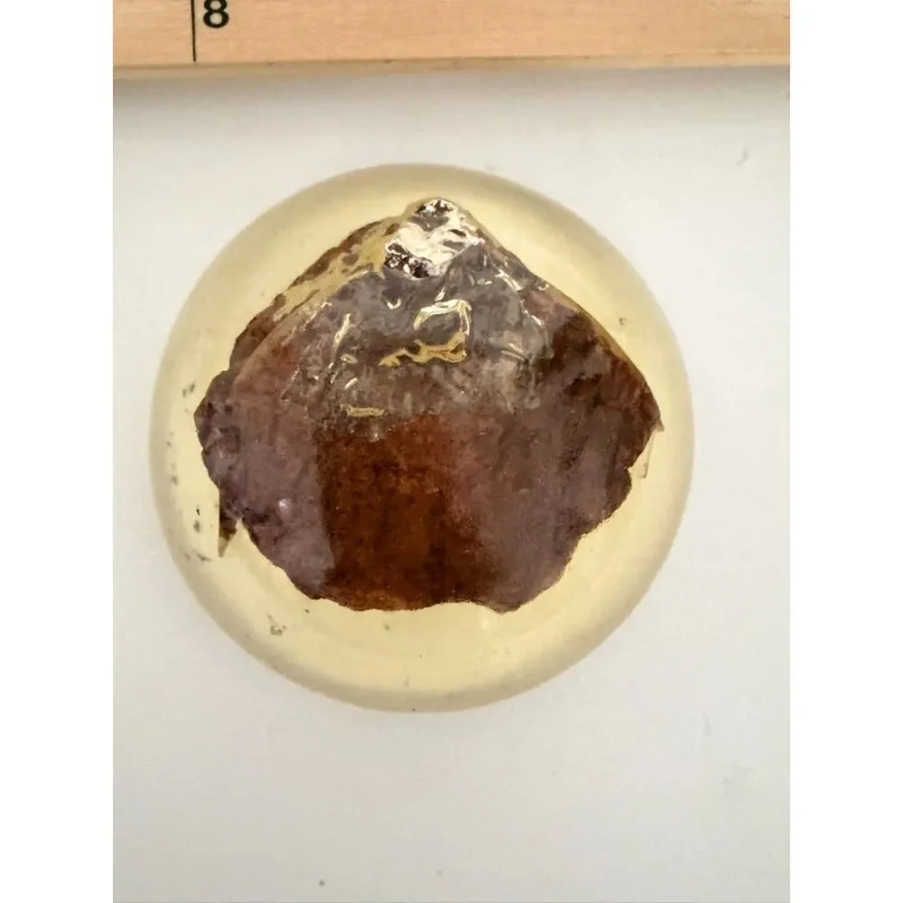 Vintage homemade paperweight  with cloth or wood trapped inside
